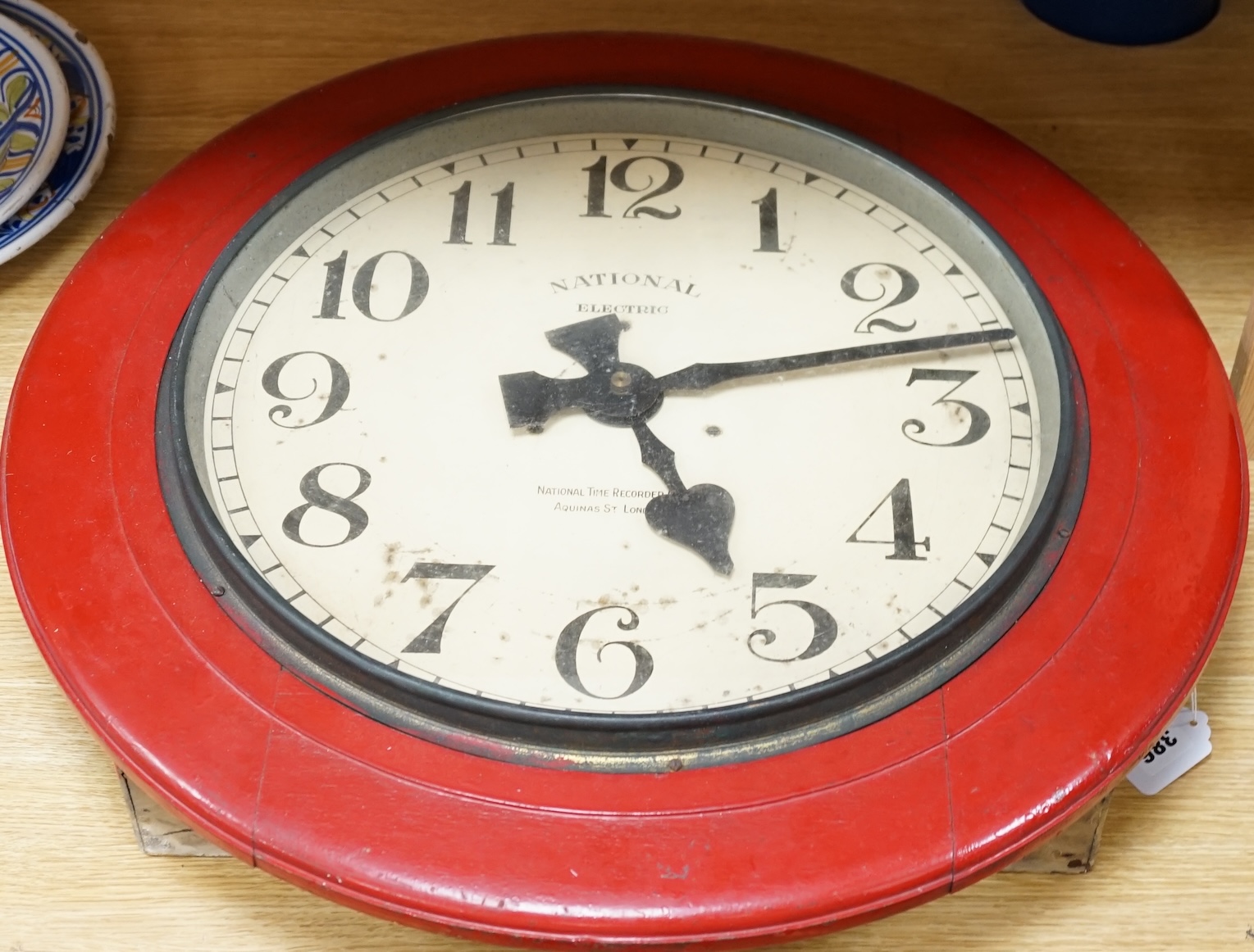 A vintage National Electric wall clock, 66cm in diameter. Condition - poor to fair